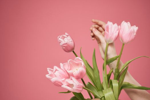 Bouquet of flowers as a gift holiday on March 8 pink background. High quality photo