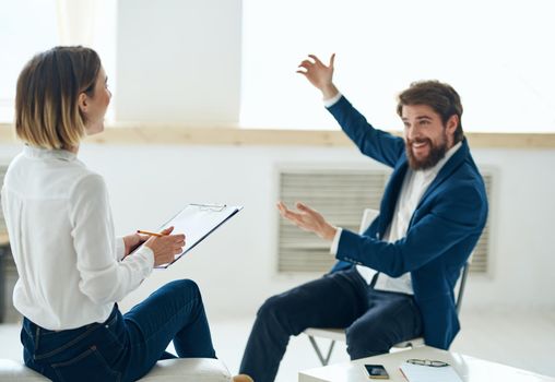 A man at the reception of a psychologist communication consultation depression treatment. High quality photo