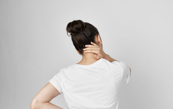 woman holding neck health problems discomfort medicine treatment. High quality photo