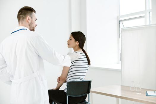 doctor in hospital woman patient checkup treatment. High quality photo
