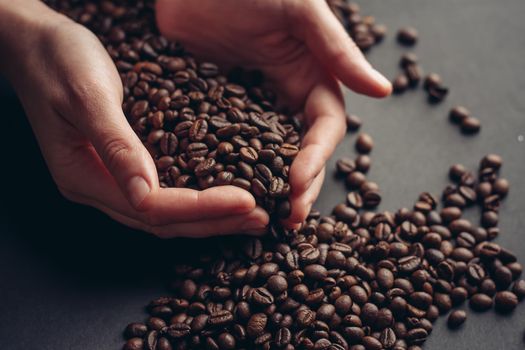 roasted coffee beans on a gray background texture Copy Space. High quality photo
