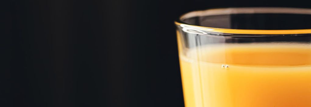 Glass of orange juice, healthy drink closeup