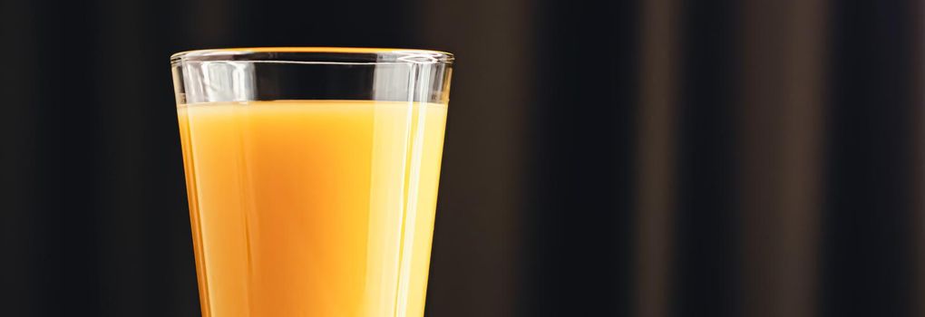 Glass of orange juice, healthy drink closeup