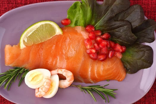 Salmon. Slices of red salted fish on a flat plate. High quality photo