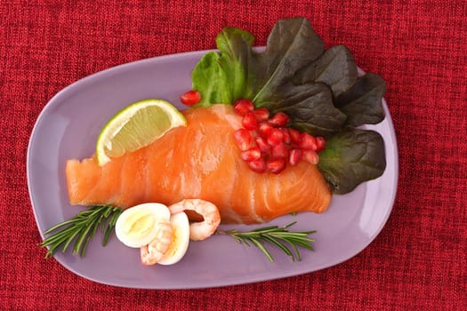 Salmon. Slices of red salted fish on a flat plate. High quality photo