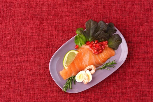 Salmon. Slices of red salted fish on a flat plate. High quality photo