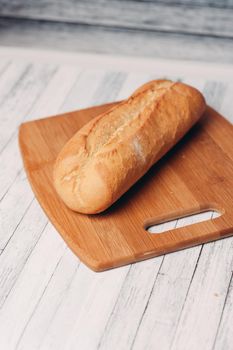 whole grain bread on wooden planks homemade pastries fresh aroma breakfast meal. High quality photo