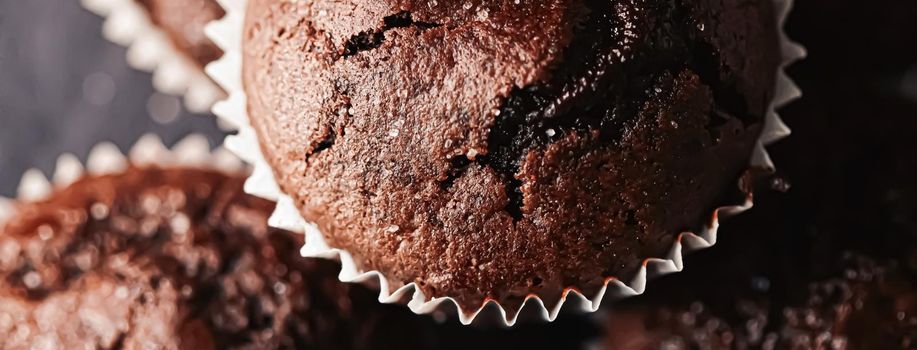 Homemade chocolate muffins, baked comfort food recipe concept