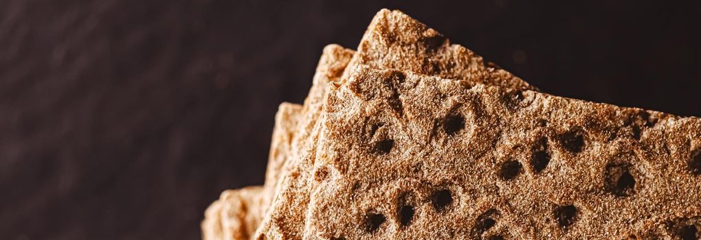 Crispy whole grain crackers, diet food closeup