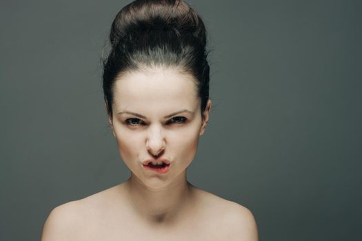 pretty woman with bare shoulders clear skin fashion glamor. High quality photo