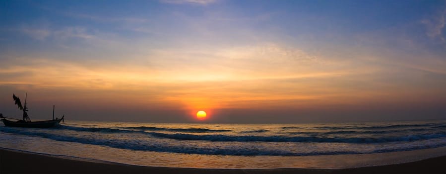 Colorful panorama sky during sunset in the twighligth sky over sea at seashore