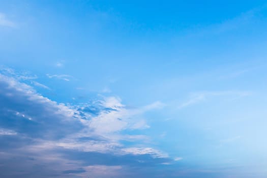 White fluffy clouds in the blue sky, Fantastic soft white clouds against blue sky