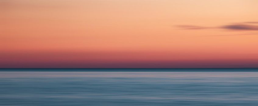 Abstract blurred sea landscape and cloudy sky background