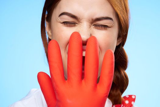 pretty woman close-up rubber glove near face podiatry work. High quality photo