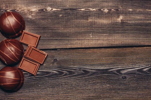 sweets pastries chocolate bar on wooden table background image. High quality photo