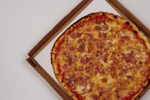 Close up on deep dish traditional Italian style food delivery.