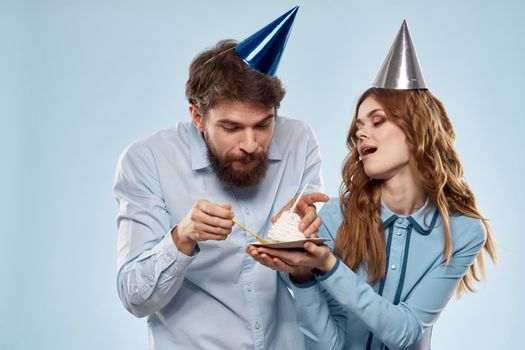Birthday cake with candle man and woman corporate party fun holidays. High quality photo
