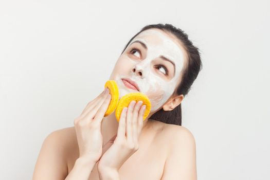 pretty brunette applying makeup skin care cosmetics cropped view. High quality photo