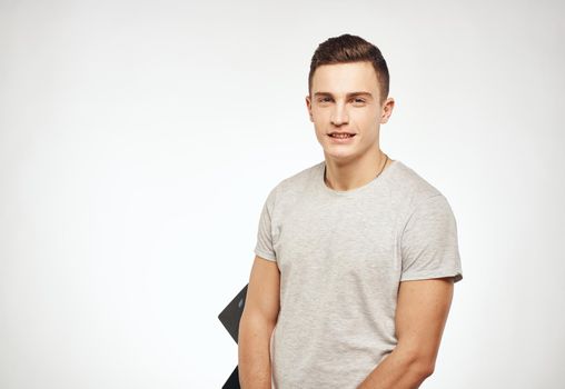 handsome man studio light background model close-up. High quality photo