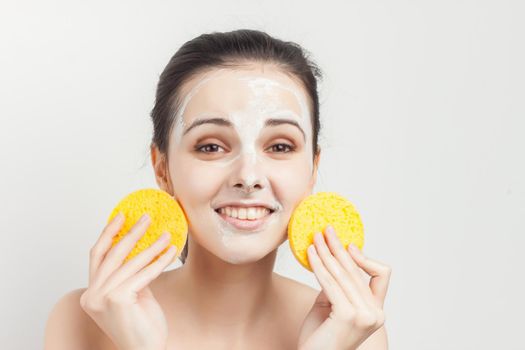 pretty woman naked shoulders face cream skin care cosmetology. High quality photo