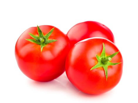 Fresh ripe red tomatoes on white background.