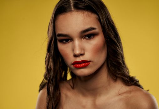 Portrait of nude woman red lips eye shadow model. High quality photo