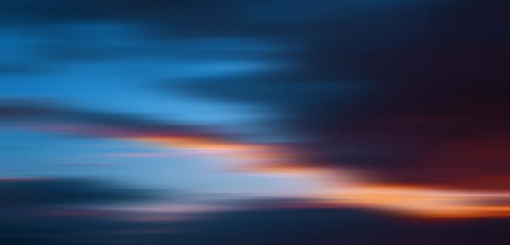 Abstract blurred nature background. Clouds in motion blur. Background for design and templates