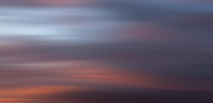 Abstract blurred nature background. Clouds in motion blur. Background for design and templates
