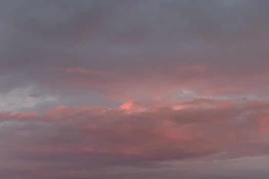 Abstract nature background. Colorful dramatic sky with cloud at sunset. Dramatic and moody pink, purple and blue cloudy sunset sky 