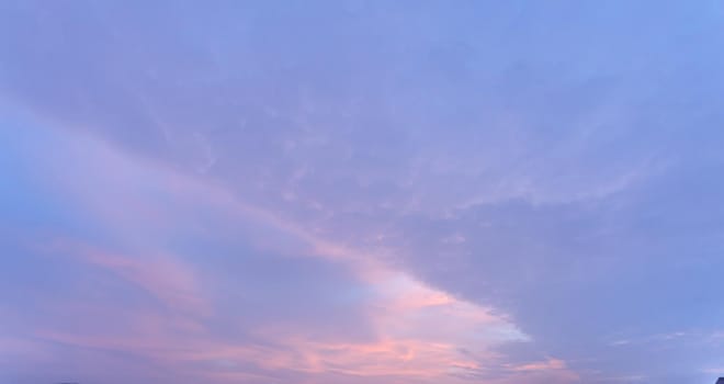 Natural background. Twilight beautiful sky. Twilight colorful sky and cloud with sunlight shine behind background