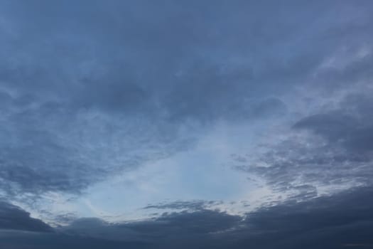 Evening sky with clouds and moon
