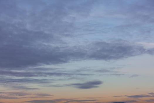 Evening sky with clouds and moon