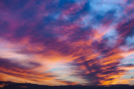 Abstract nature background. Colorful dramatic sky with cloud at sunset. Dramatic and moody pink, purple and blue cloudy sunset sky
