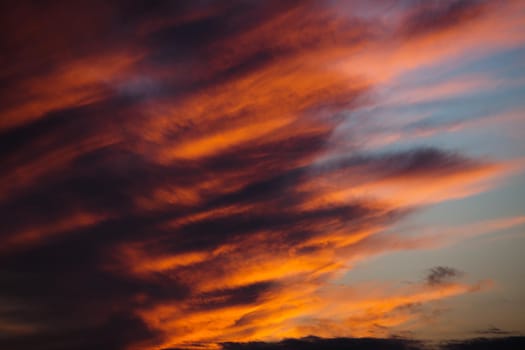 Abstract nature background. Colorful dramatic sky with cloud at sunset. Dramatic and moody pink, purple and blue cloudy sunset sky