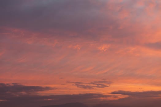 Abstract nature background. Colorful dramatic sky with cloud at sunset. Dramatic and moody pink, purple and blue cloudy sunset sky