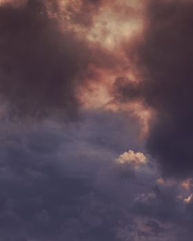 Abstract nature background. Colorful dramatic sky with cloud at sunset. Dramatic and moody pink, purple and blue cloudy sunset sky