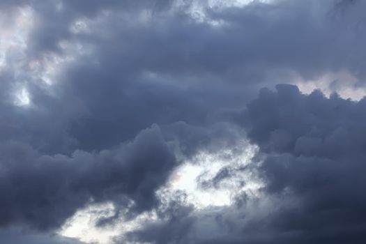 Abstract nature background. Colorful dramatic sky with cloud at sunset. Dramatic and moody blue cloudy sunset sky