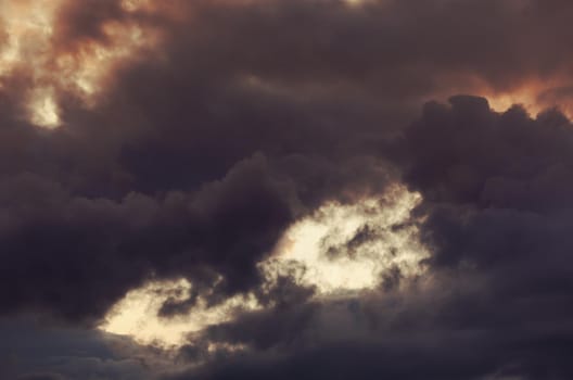 Abstract nature background. Colorful dramatic sky with cloud at sunset. Dramatic and moody pink, purple and blue cloudy sunset sky