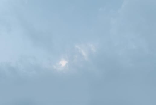 Natural sky background with clouds in light tonality. Abstract nature image for background use.