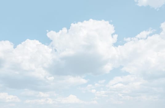 Natural sky background with clouds in light tonality. Abstract nature image for background use.