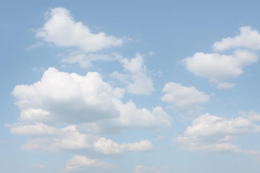 Natural sky background with clouds in light tonality. Abstract nature image for background use.