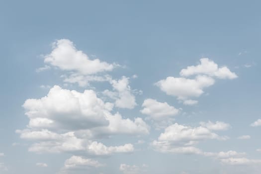 Natural sky background with clouds in light tonality. Abstract nature image for background use.