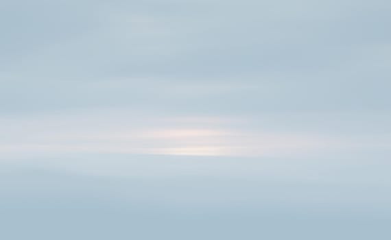 Natural sky background with clouds in light tonality. Abstract nature image for background use.