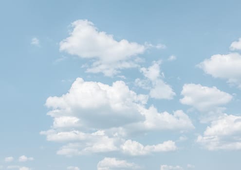 Natural sky background with clouds in light tonality. Abstract nature image for background use.