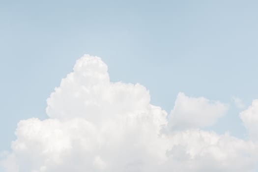 Natural sky background with clouds in light tonality. Abstract nature image for background use.