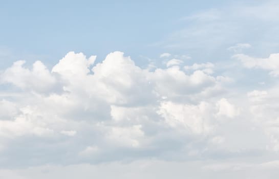 Natural sky background with clouds in light tonality. Abstract nature image for background use.
