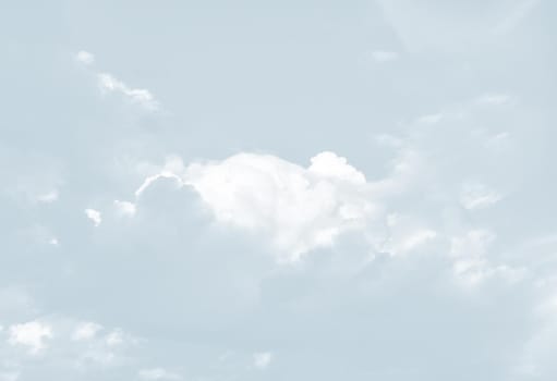 Natural sky background with clouds in light tonality. Abstract nature image for background use.
