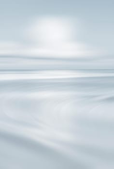 Natural sky background with clouds in light tonality. Abstract nature image for background use.