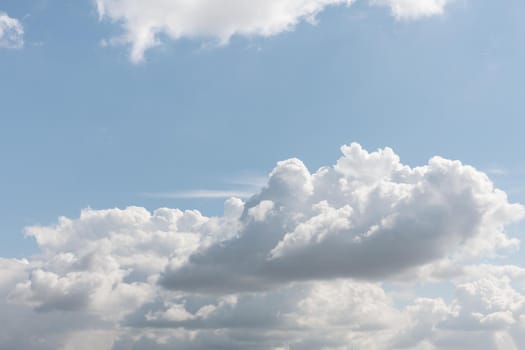 Natural sky background with clouds in light tonality. Abstract nature image for background use.
