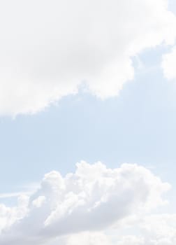 Natural sky background with clouds in light tonality. Abstract nature image for background use.